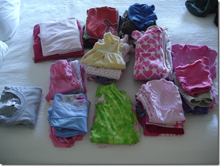 Folded clothes sorted by person